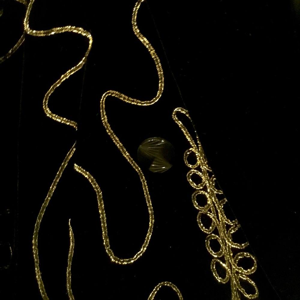 Black fine velvet 4 button double breasted Jacket. Decorated with gold soutache.